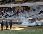 Kenyan police fire teargas to disperse mourners at Raila Odinga's public viewing – video