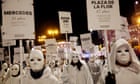 World's women march to mark International Day for the Elimination of Violence Against Women – video